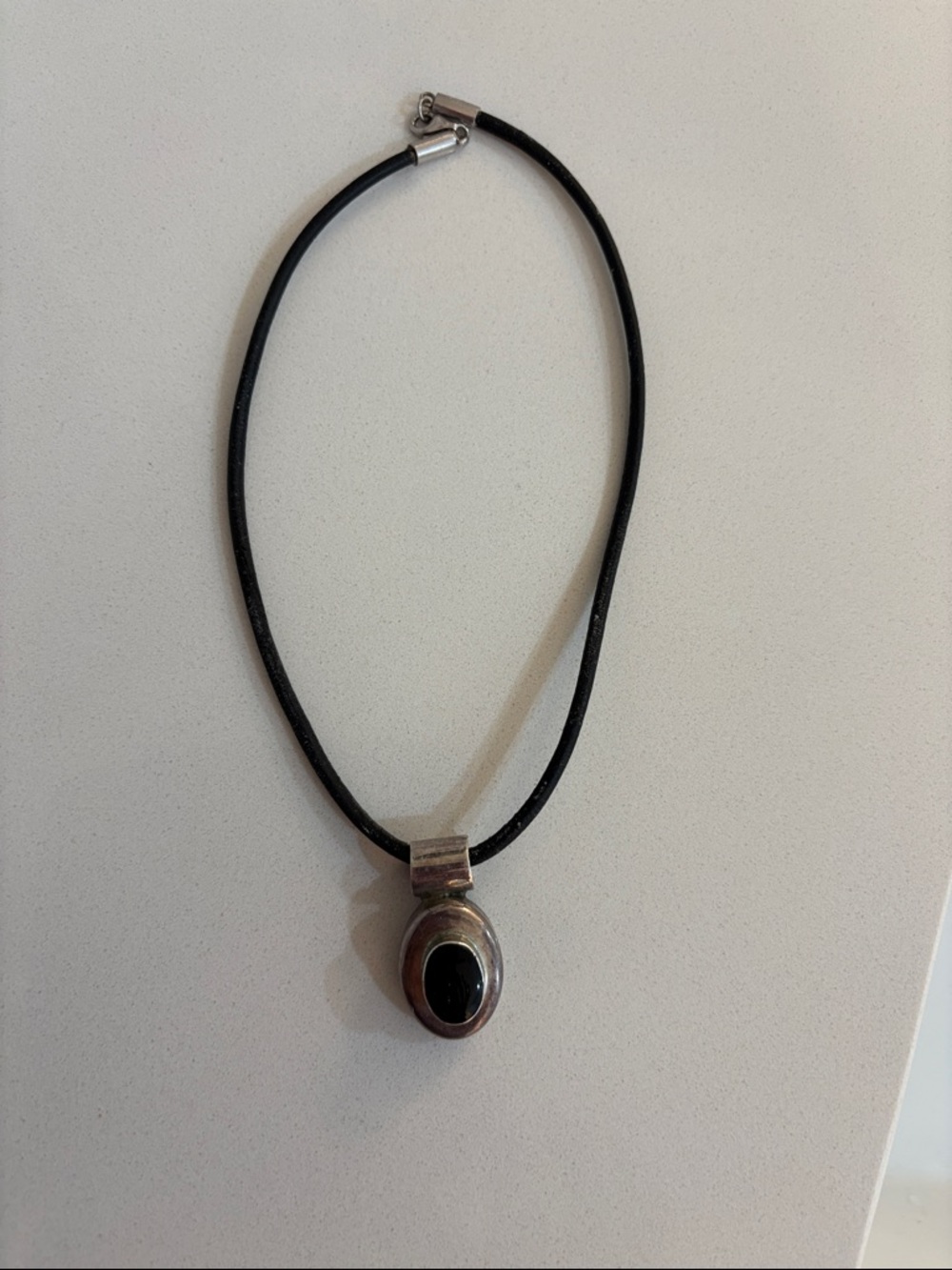 Black Leather Cord Necklace with Silver Pendant